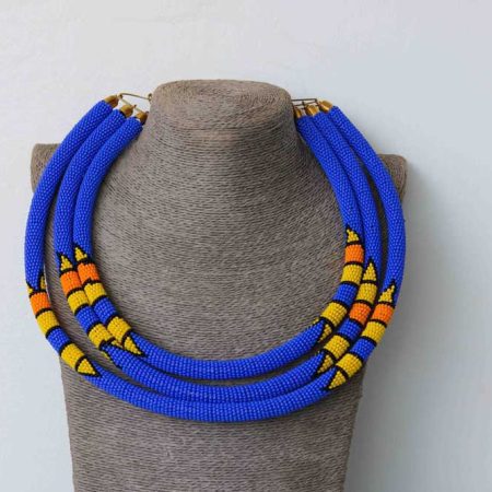REHEMA Blue Beaded Necklace is made using glass beads and thread.