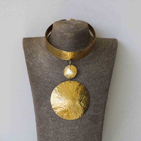 This African brass necklace is unique and compliments any outfit.