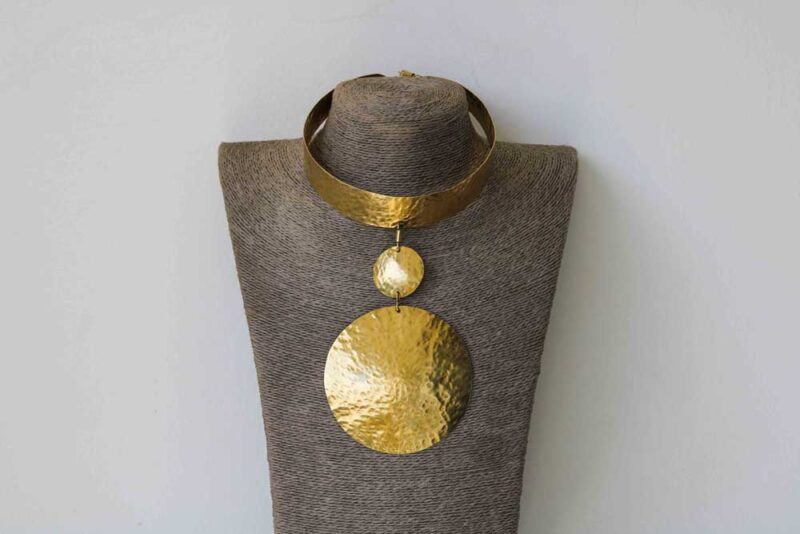 This African brass necklace is unique and compliments any outfit.